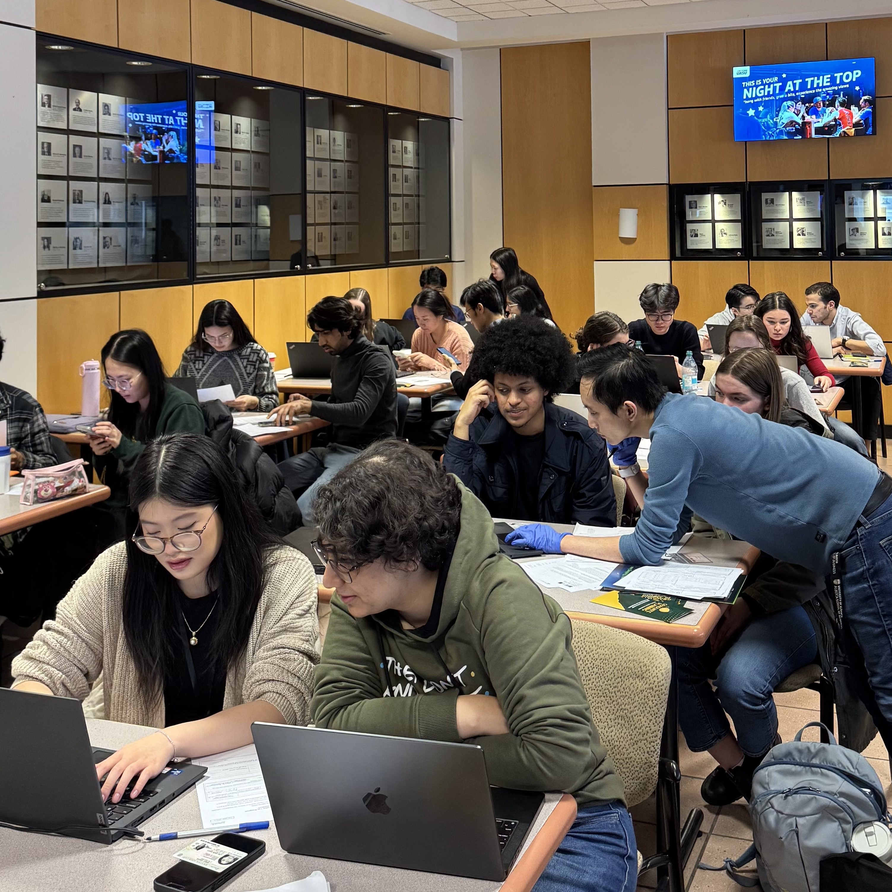 UAAC volunteers helping students with their taxes